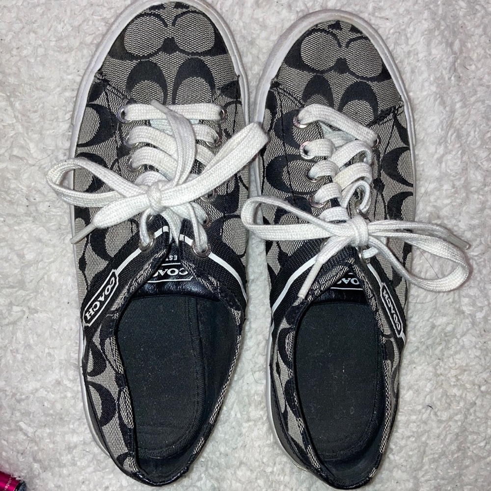A pair of women’s coach shoes size 7
